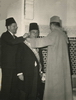 1960 - King Mohamed V and Chief of Protocol decorating Eltaher - Royal Palace Rabat Edited